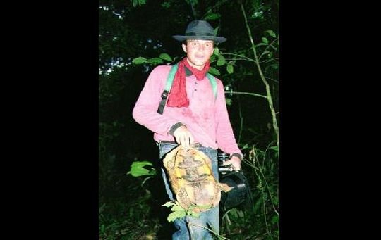 Alex holding a tortoise